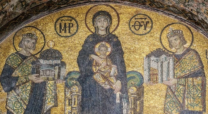 10th-century Byzantine mosaic in the Imperial Gate vestibule depicting Virgin Mary with Child, Emperor Constantine I offering the city model and Emperor Justinian I presenting Hagia Sophia