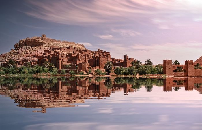 Earthen kasbah village of Ait Benhaddou stacked on a hillside above the Ounila river