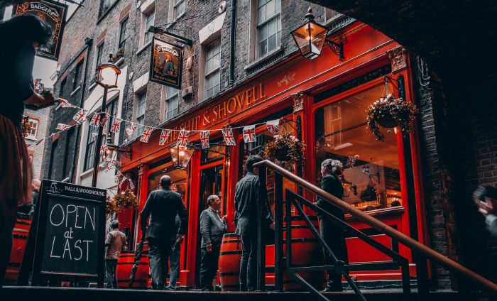 Narrow historic backstreet and Victorian pub in the City of London