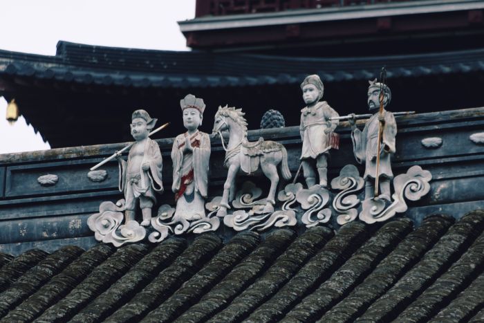 The main hall and stone horses at the White Horse Temple, the first Buddhist temple in China, Luoyang