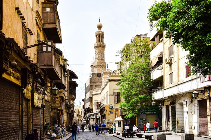 Al-Muizz Street in Islamic Cairo with the minarets of the medieval mosques and madrasas