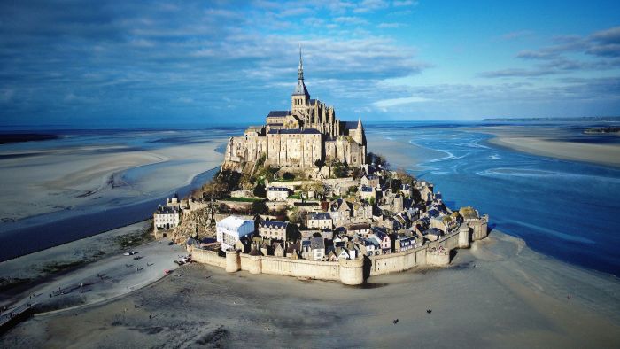 Mont-Saint-Michel and its abbey rising above the bay in Normandy