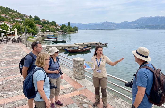 English-speaking licensed guide on the shore of Lake Shkodër at Shirokë