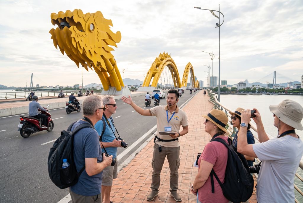 Licensed tour guide with travellers at the Dragon Bridge, Da Nang, on a private tour
